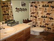 Cabin includes two bathrooms with separate private master bath.